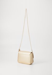 Metallic gold crossbody bag with a textured finish, chain strap, and rectangular shape. Features a flap closure and minimalist design.