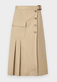 Beige kneelengde skjørt laget av en bomullsblanding. Har frontknapper, en sidelomme og legg for struktur. Glatt tekstur.
