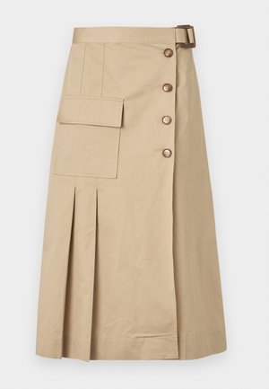 Beige knælang nederdel lavet af bomuldsblanding. Har forreste knapper, en sidelomme og folder for struktur. Glat tekstur.