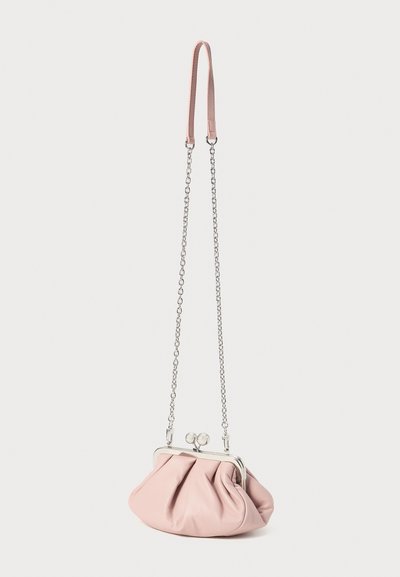 Pink leather clutch with a gathered design, silver frame and clasp, long silver chain strap, and smooth texture.