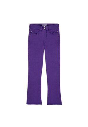 Lilla børnejegginger med dobbelt knaplukning, lommer foran og bagpå samt lige ben på hvid baggrund.