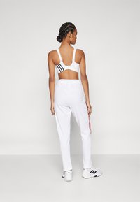 adidas Sportswear TIRO CUT 3 STRIPES TRACKPANTS - Treniņtērpa apakšdaļas - white/team navy blue/better scarlet