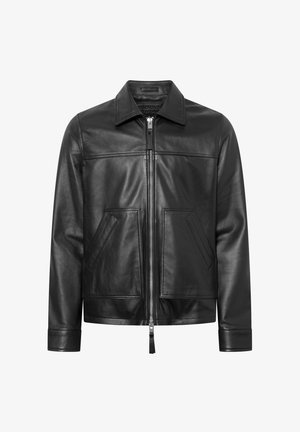 Musta nahkatakki, jossa on litteä kaulus, edessä vetoketju, kaksi kulmaista taskua ja ommeltu yksityiskohta rinnassa sekä sivuilla.