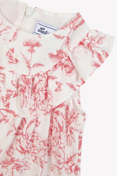 Vestido de algodão floral com mangas em babados, apresentando estampas botânicas vermelhas sobre um fundo branco e fecho de zip na parte de trás.