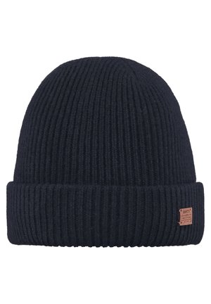 Gorro de punto en un azul marino oscuro con una textura acanalada, que presenta un puño doblado y una etiqueta de logo de cuero marrón en el lateral.