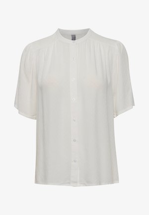 Balta trumpa rankovėmis bluzelė su klasikiniu apykakle, turinti mygtukų užsegimą priekyje ir subtilia tekstūra visame audinyje.
