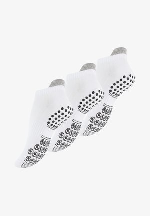 White ankle socks with gray ribbed cuffs; black rubber grip dots on the soles; lightweight knit material; three pairs included.