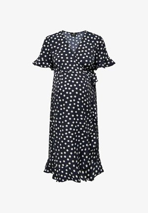 Jūrų mėlės' polka taškų apykaklės su trumpomis raukšlėmis, šono juostos detale ir plačiu hemu. Pagaminta iš minkštos medžiagos, tinkama nėštumo drabužiams.