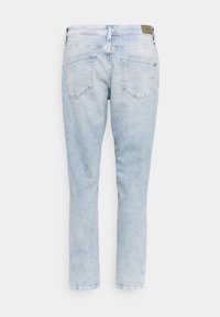Back view of light blue denim jeans with straight legs and two back pockets on a white background.
