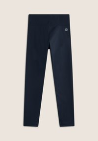 Leggings de color navy hechos de una tela suave y elástica. Presentan una cinturilla ancha y cómoda, y un pequeño logo de la marca en el costado.