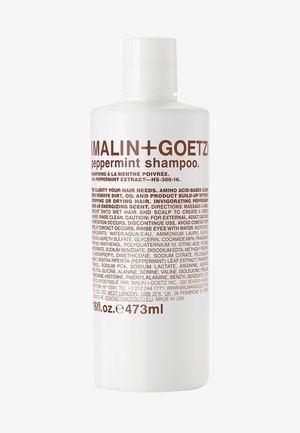 Weißes Kunststoffflasche von MALIN+GOETZ Pfefferminz-Shampoo, 473 ml. Mit braunem Text, einem runden Deckel und beschriftet mit Produktdetails und Inhaltsstoffen.