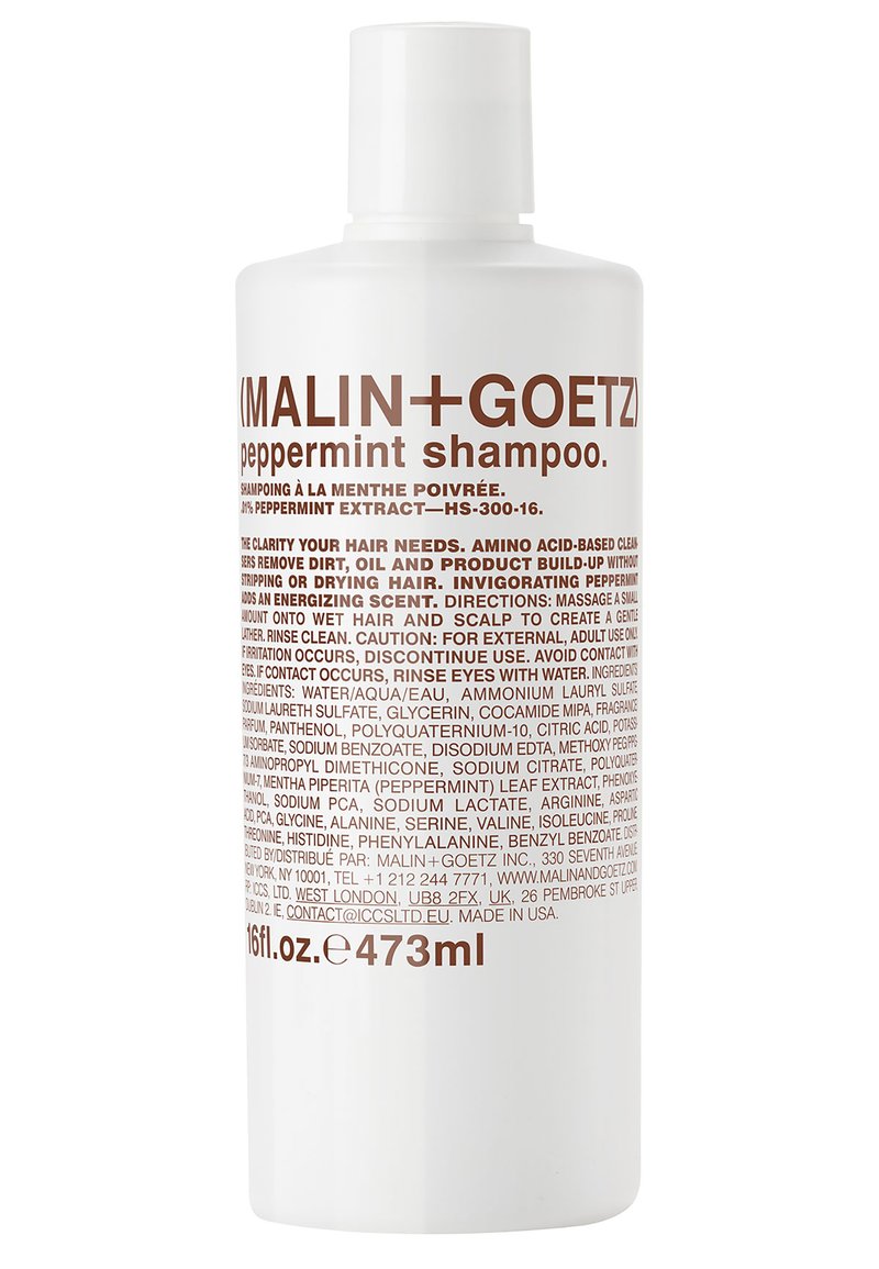Bottiglia di plastica bianca di shampoo alla menta MALIN+GOETZ, 473 ml. Presenta testo marrone, un tappo rotondo ed è etichettata con dettagli sul prodotto e ingredienti.