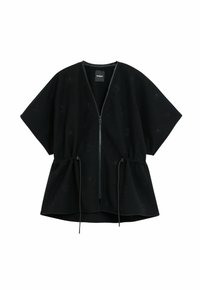 Giacca nera con zip, maniche corte, vita elasticizzata, realizzata in tessuto morbido. Presenta motivi circolari a texture su tutta la superficie.
