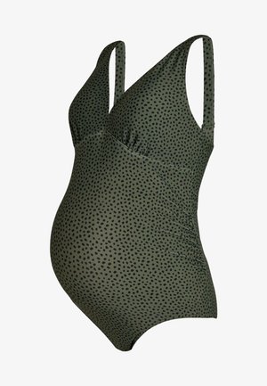Olivgrüner Umstandsbadeanzug mit schwarzem unregelmäßigem Punktemuster, gerafften Seiten und breiten, stützenden Schulterträgern.