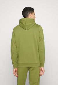 Puma BETTER ESSENTIALS - Felpa - olive green