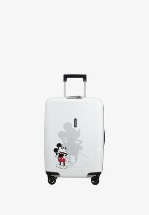 White suitcase with ridged texture, featuring a colorful Mickey Mouse design. Four black wheels and an extendable handle.