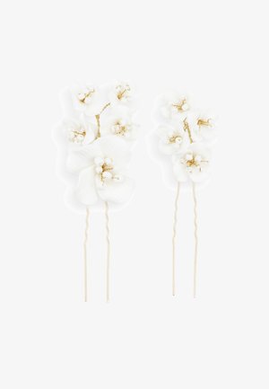 Fermagli bianchi floreali con intricate forme di orchidee, petali texturizzati e dettagli in filo dorato. Inclusi due fermagli.
