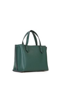 Sac fourre-tout en cuir vert au design structuré, avec des poignées courtes et des bords contrastants, présentant une finition texturée et une base plate.