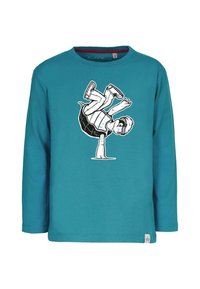 Turkis langærmet skjorte med et sort og hvidt grafik af et barn, der står på hænder oven på en skildpadde. Blødt bomateriale, rund hals design.