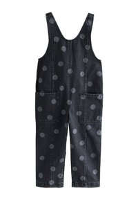 Salopette en denim gris foncé avec de grands pois gris clair. Comprend deux poches avant et des bretelles ajustables. Coupe à jambes larges.