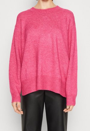 Stickad tröja - pink