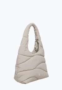 Borsa puffer beige con un motivo a onda unico, texture morbida, grande manico aperto e dettaglio del logo frontale, che offre un aspetto moderno e funzionalità.