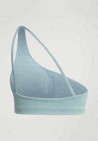 Jasnoniebieski, prążkowany biustonosz braletka z cienkimi ramiączkami i jednolitym projektem na jedno ramię. Wykonany z gładkiego materiału, charakteryzującego się miękką teksturą i minimalnym przeszyciem.