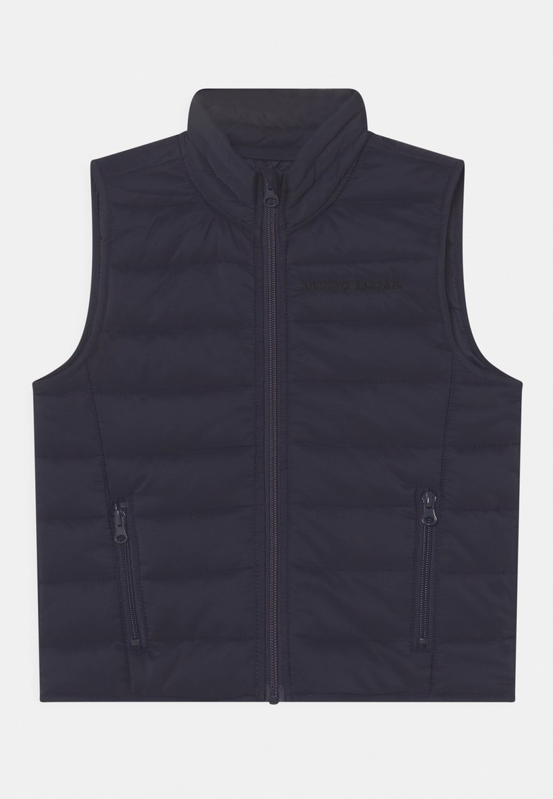 Veste matelassée sans manches bleu marine avec col montant, fermeture éclair devant et deux poches latérales zippées.