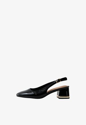 Black patent leather slingback shoe with low block heel and gold buckle detail on heel and ankle strap.