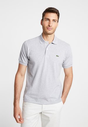 Gray cotton polo shirt with a collar, short sleeves, and a small green logo on the left chest. Smooth texture and classic fit.