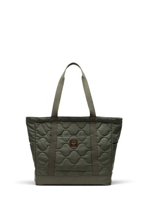 Bolso tote acolchado en verde oliva, con dos asas de tela resistentes, un bolsillo frontal y un patrón hexagonal texturizado.