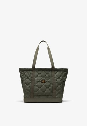 Torba s quiltingom u maslinastoj boji, s dva čvrsta platnena ručka, prednjim džepom i teksturiranim heksagonalnim uzorkom.