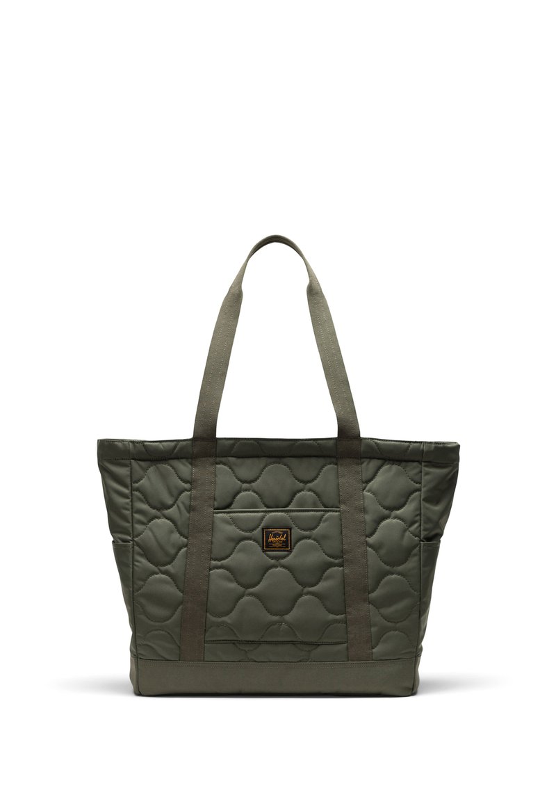 Gequilted tote bag in olijfgroen, met twee stevige stoffen handvatten, een voorklep en een textuur met zeshoekig patroon.