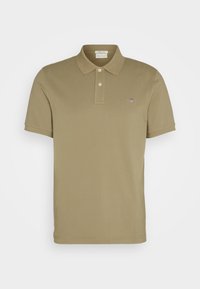 Polo tričko s krátkým rukávem v khaki barvě, vyrobené z bavlny, s límečkem na tři knoflíky, vyšívaným logem na levé hrudi a hladkou texturou.
