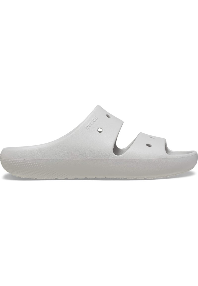 Zoccolo grigio chiaro realizzato in materiale simile alla gomma, con due aperture superiori, fori di ventilazione e una suola texturizzata per la trazione.