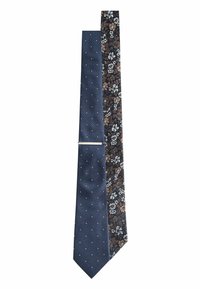 Unselected, navy blue floral polka dot