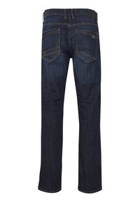 Mørkeblå denimjeans med rette ben. Har to baklommer og kontrasterende gul søm. Teksturert stoff.