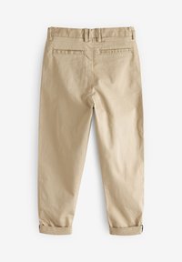 Beige Baumwollhose mit einem konischen Bein. Zu den Merkmalen gehören zwei Gesäßtaschen und umgeschlagene Säume. Markenlabel am Bund.
