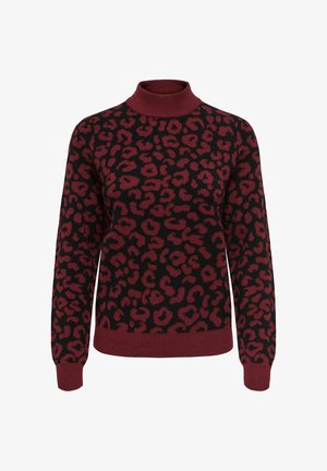 Burgunderfarget genser med høy hals med sort leopardmønster. Mykt strikket materiale med ribbestrikkede mansjetter og nederkant. Løs passform.