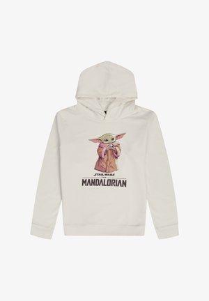 Felpa color crema con grafiche di un personaggio dei cartoni animati con grandi orecchie, che indossa una veste marrone, e la scritta "STAR WARS THE MANDALORIAN."