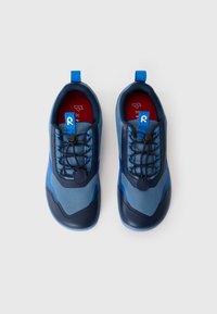 Blue sports shoes featuring a mesh upper, rubber toe cap, elastic laces, adjustable toggle, and a red insole with a size label.