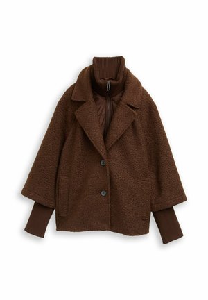 Bruine jas met een gestructureerde, pluizige buitenkant, dubbele knopen, grote kraag en geribbelde col met een ritssluiting.