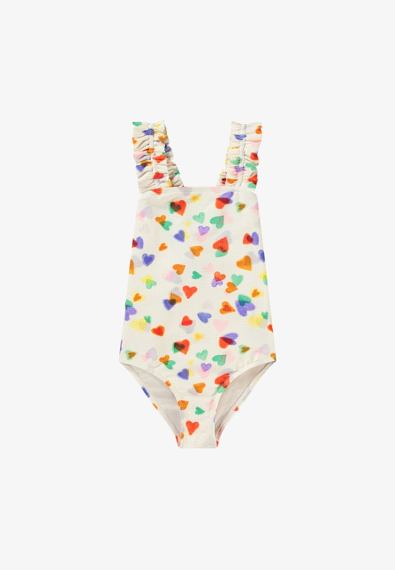 Maillot de bain coloré à motif cœur en crème, présentant un tissu texturé et des bretelles épaules froncées pour plus de détail et de style.