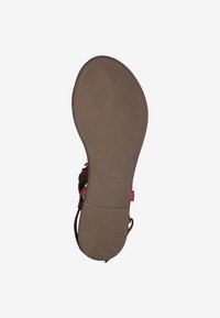 Sandalia rosa con una plantilla estampada, suela de goma lisa y un diseño de tira. Talla 37 marcada en la parte inferior.