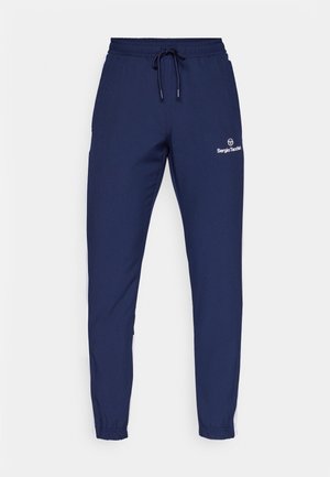 Navy Jogging-Hosen aus weichem Stoff, mit einem elastischen Bund und Kordelzug, seitlichen Taschen und einem weißen Logo am Oberschenkel.