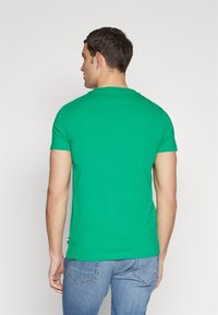 Tommy Hilfiger T-shirts med print - olympic green