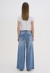 My Essential Wardrobe DANGOMW HIGH X-WIDE  - Platėjantys džinsai - light blue retro wash