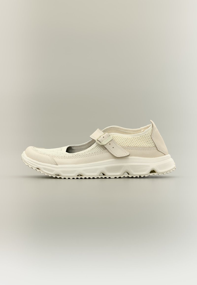 Light beige casual Mary Jane shoe with breathable mesh upper, adjustable strap, cushioned sole, and textured grip outsole.