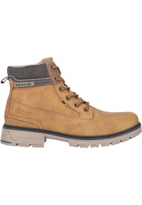 Bruna läderboots i mid-top med grå textilkrage, gyllene ögla, svart gummisula och präglade detaljer på sidan.