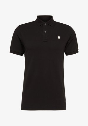 Black polo shirt made of cotton, featuring a two-button placket, short sleeves, and a small logo on the left chest. Smooth texture.
